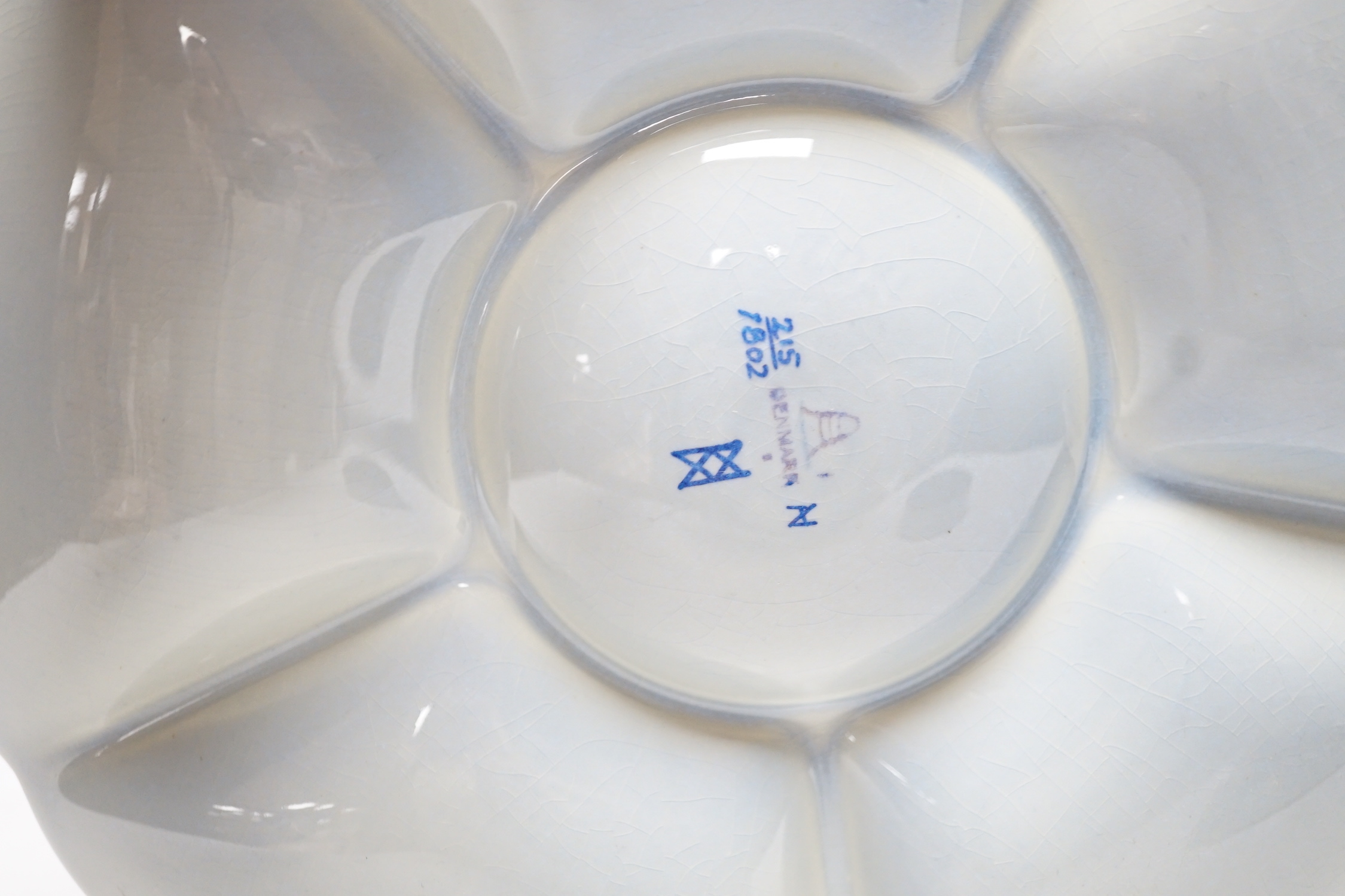 A Royal Copenhagen Alumina ware blue and white vase, a bamboo handled pot, a circular five section entre dish and shallow circular ringed vase, blue and white vase 18cm